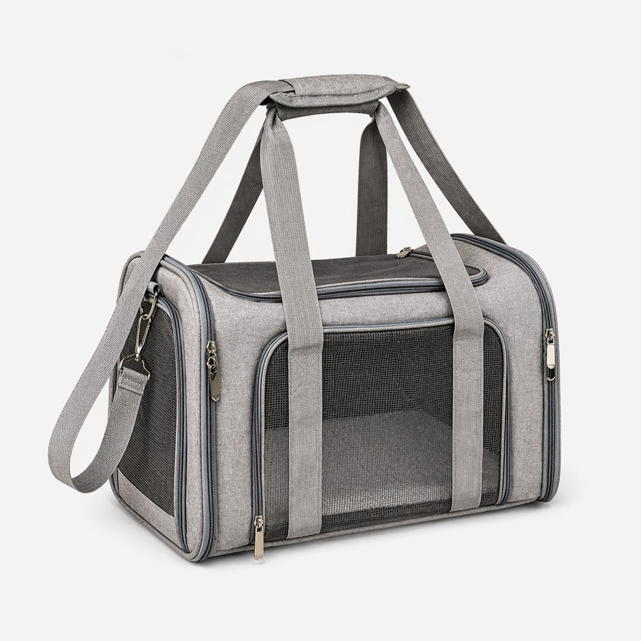 Gray soft-sided pet carrier bag with mesh panels and carry handles on a light gray background