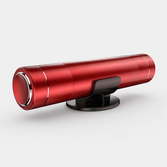 Red emergency window breaker mounted on a small stand with a clean light grey background and soft natural shadow.